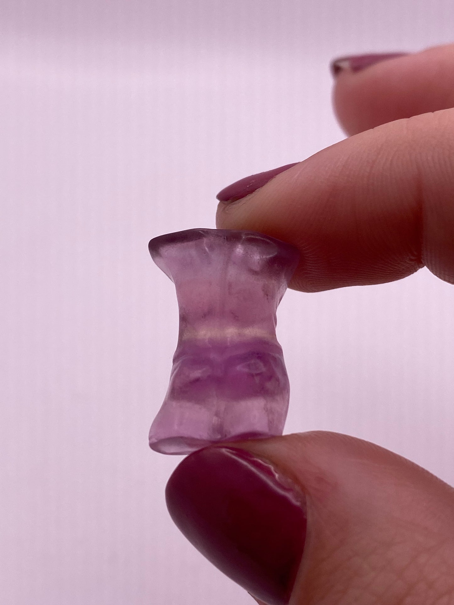 Fluorite male body carving