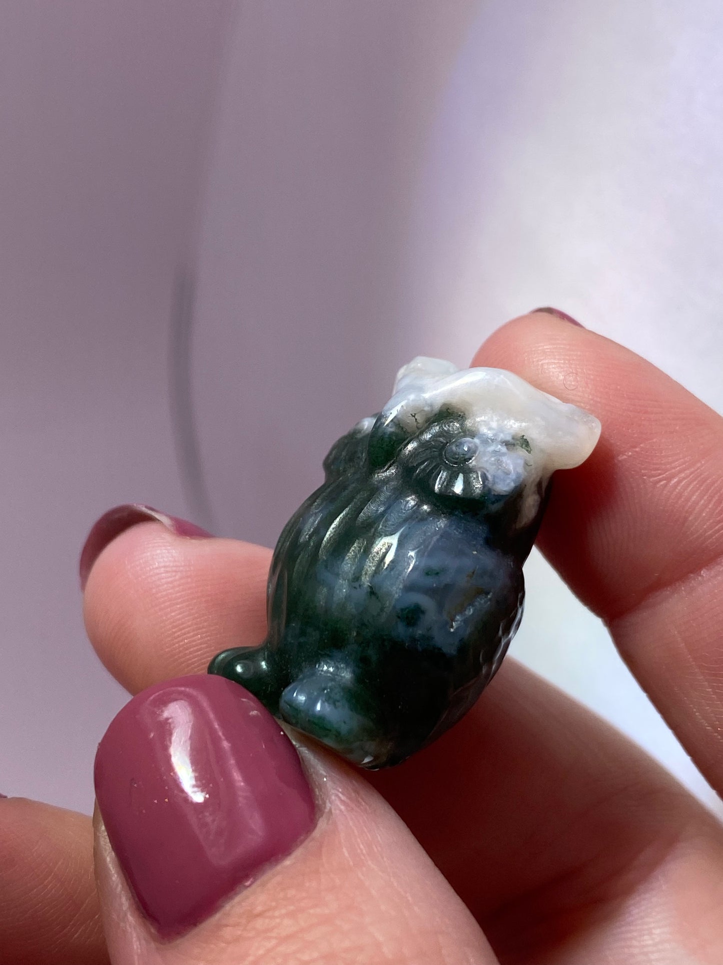 Moss agate owl carving