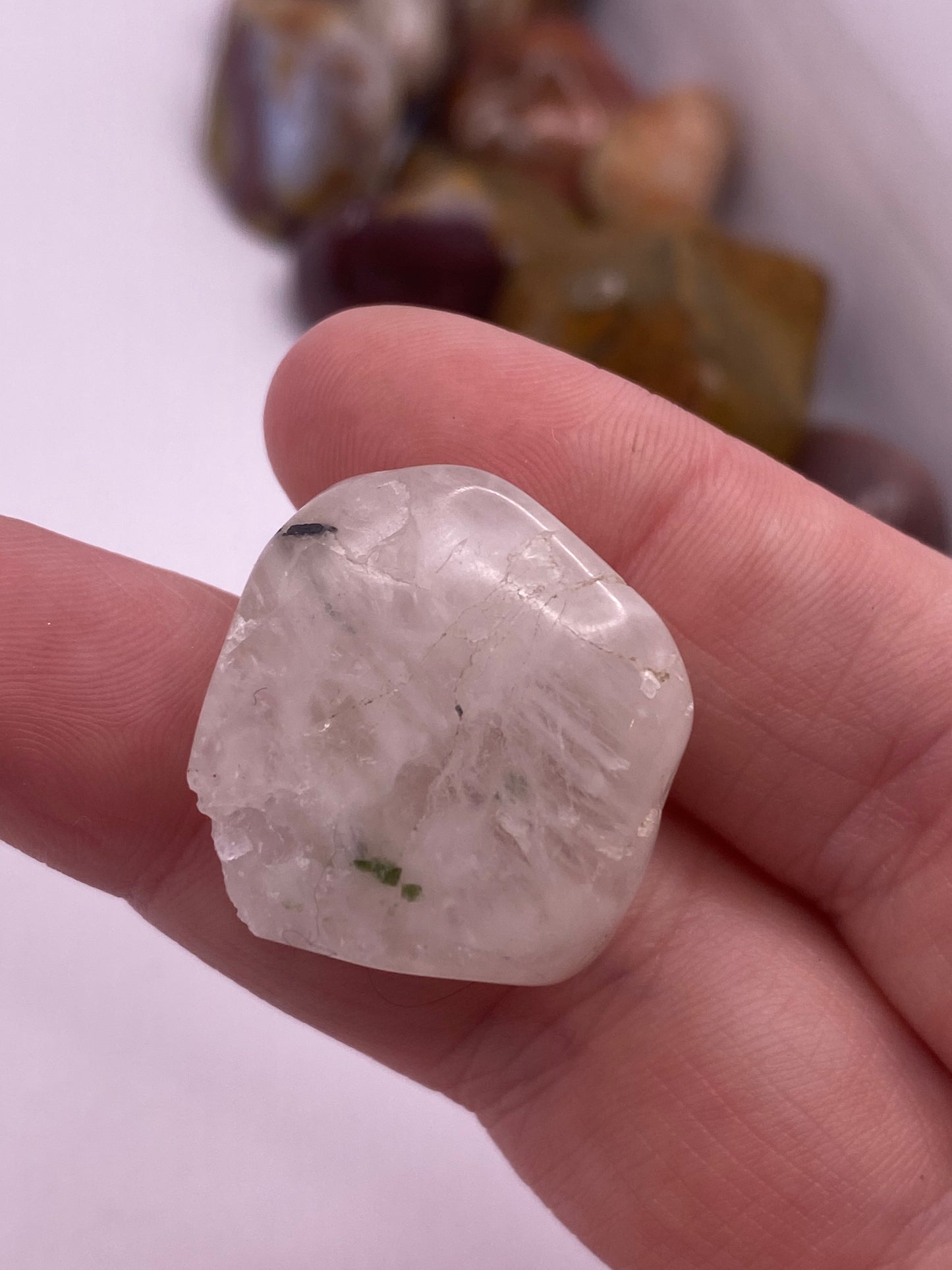 Epidote in quartz tumble